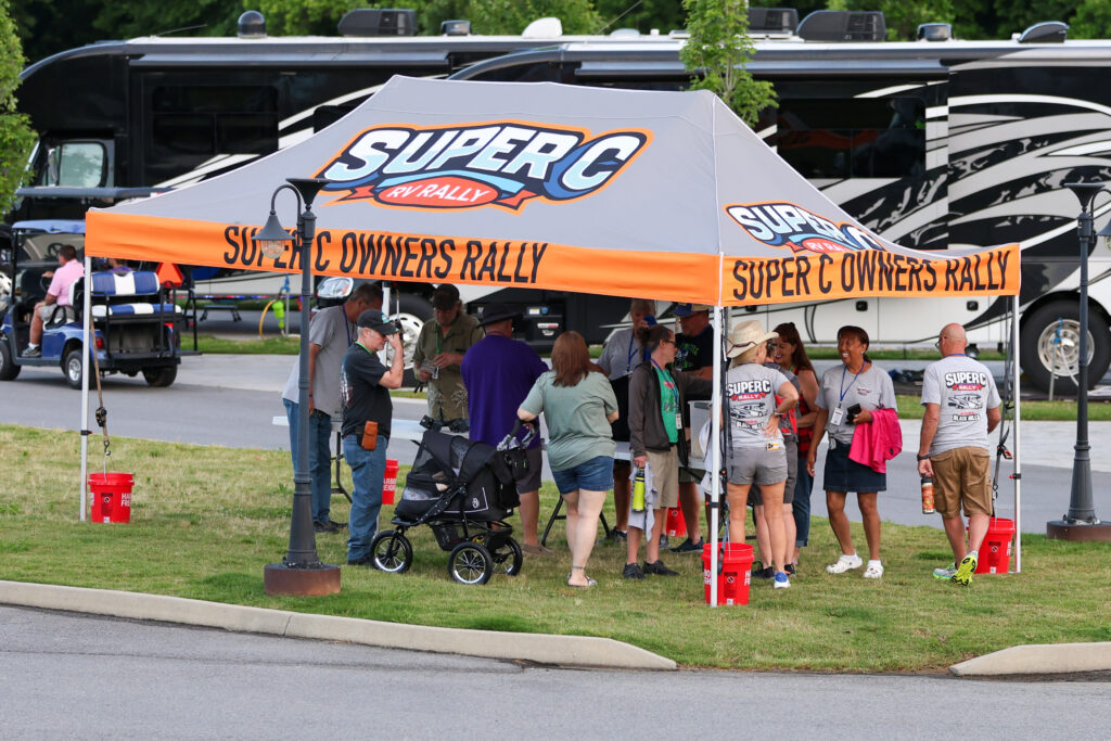 Owners at the Super C Owners Rally tent